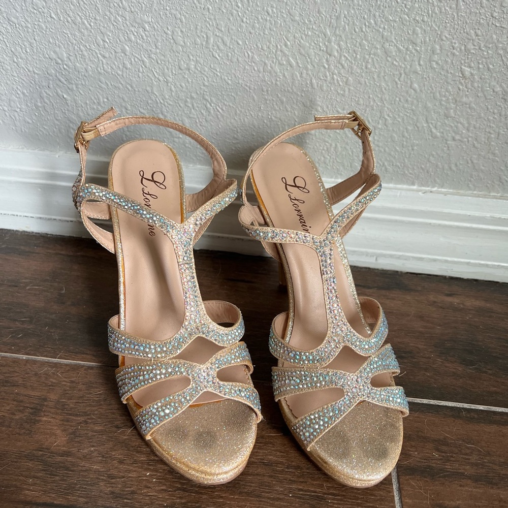 Size 8 gold with crystals Lauren Lorraine heels. Wore once for prom.